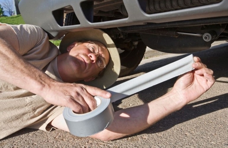 fixing car with duct tape